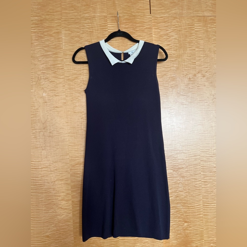 Navy knit dress in size 38 with pearl detail